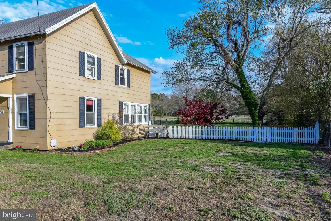 28253 Riverside Drive Salisbury, MD 21801 - Photo 22 of 22 a view of a house with a yard and plants
