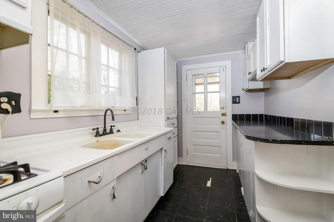 28253 Riverside Drive Salisbury, MD 21801 - Photo 8 of 22 a kitchen with a sink and cabinets