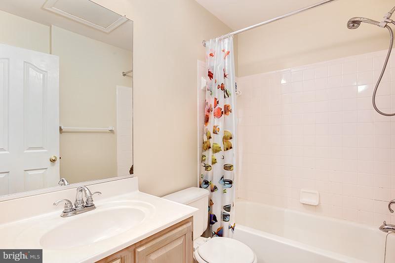 3036 Old Channel Road Laurel, MD 20724 - Photo 15 of 30 a bathroom with a sink a toilet and shower