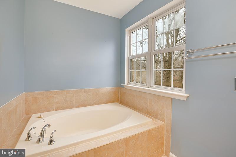 3036 Old Channel Road Laurel, MD 20724 - Photo 23 of 30 a bathroom with bathtub