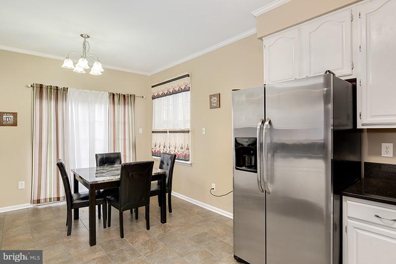 3036 Old Channel Road Laurel, MD 20724 - Photo 7 of 30 a view of a dining room with furniture