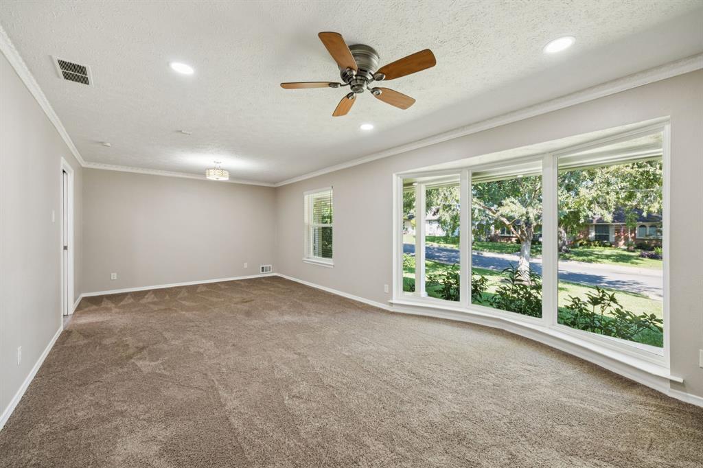 9536 Millridge Drive Dallas, TX 75243 - Photo 15 of 33 a view of an empty room with a window