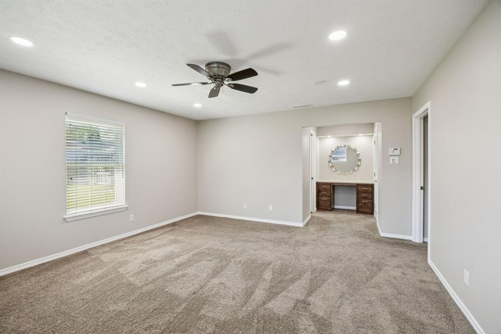 9536 Millridge Drive Dallas, TX 75243 - Photo 27 of 33 a view of an empty room with a window