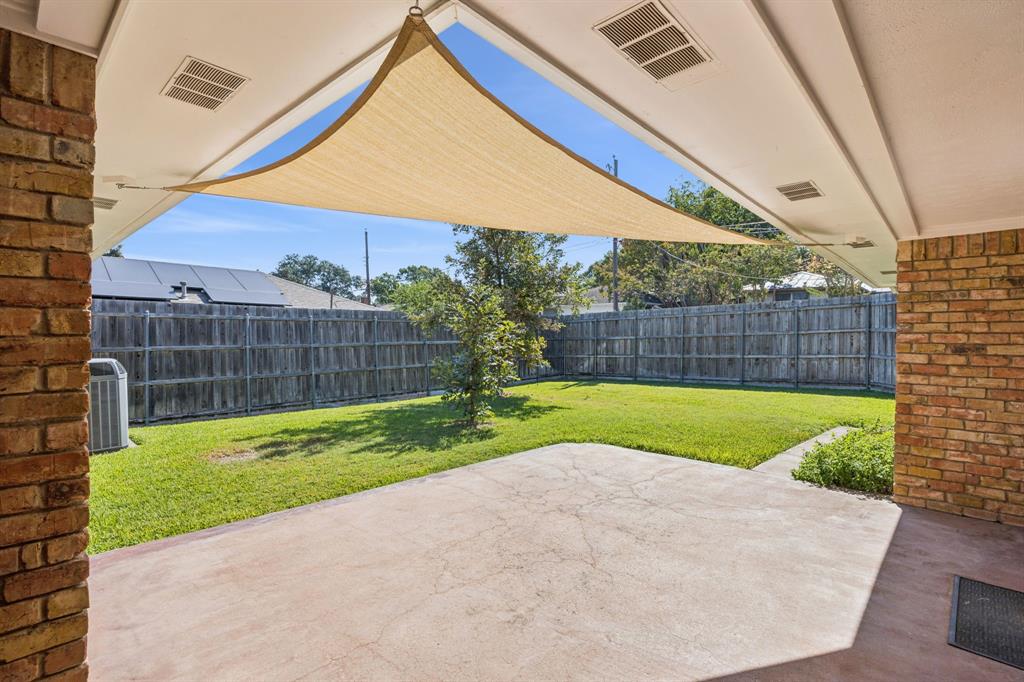9536 Millridge Drive Dallas, TX 75243 - Photo 31 of 33 a view of backyard with swimming pool and outdoor seating