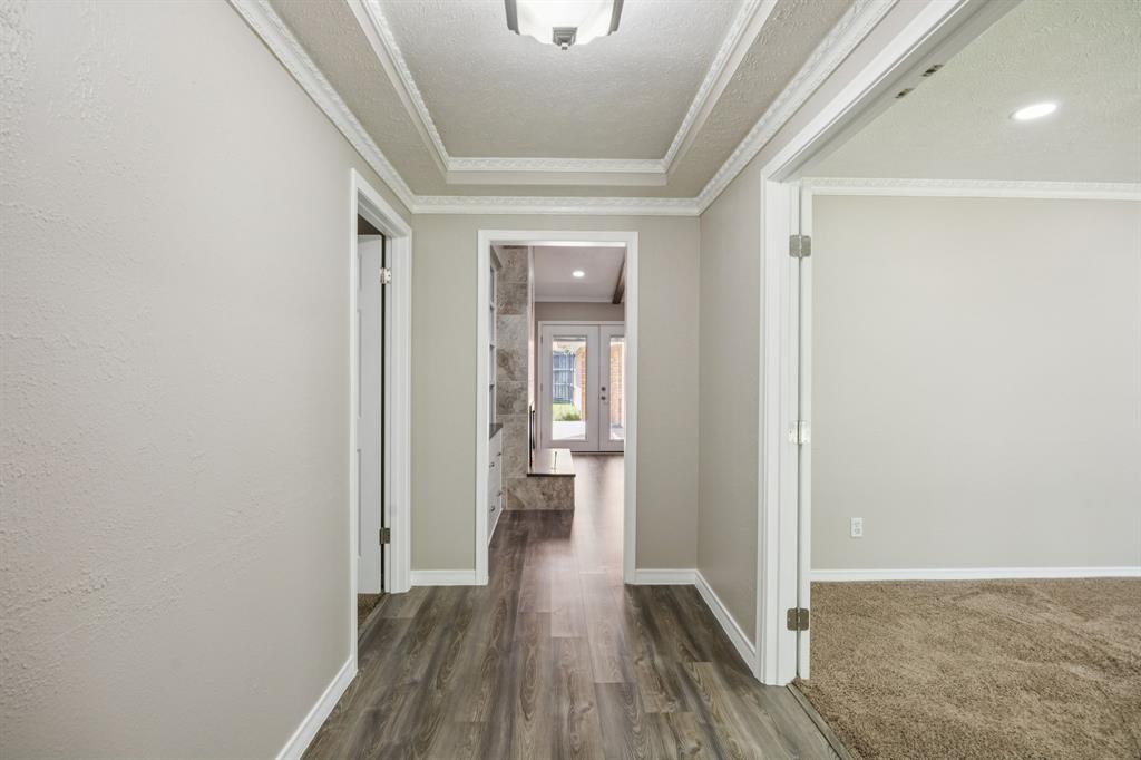 9536 Millridge Drive Dallas, TX 75243 - Photo 8 of 33 a view of hallway with wooden floor