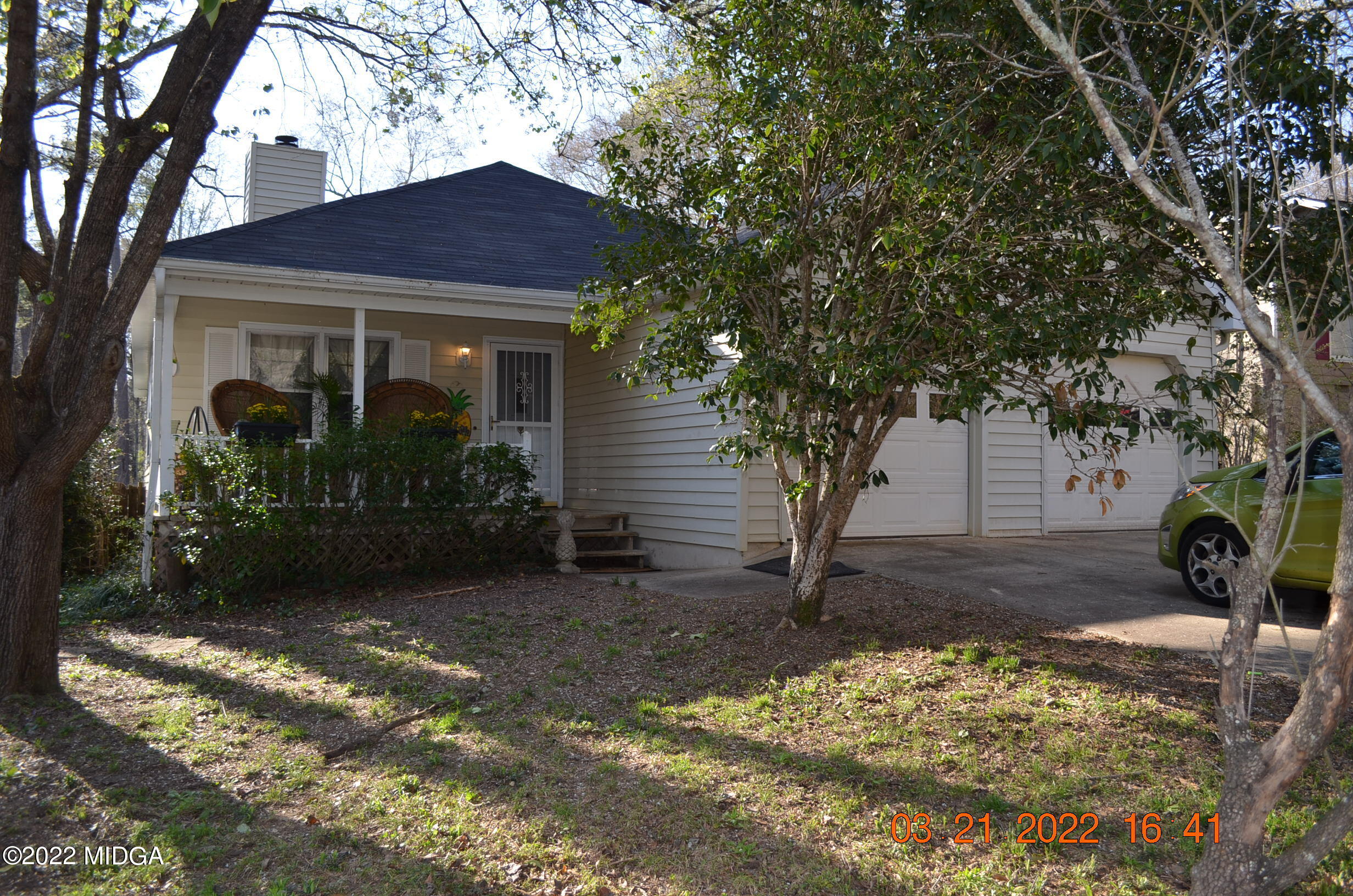 1167 Ridgeview Circle Macon, GA 31220 - Photo 1 of 26 a front view of a house with garden