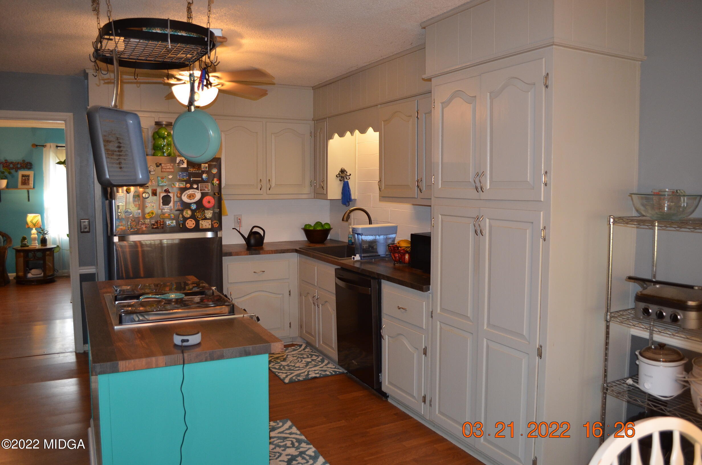 1167 Ridgeview Circle Macon, GA 31220 - Photo 20 of 26 a kitchen with stainless steel appliances a stove a refrigerator and cabinets