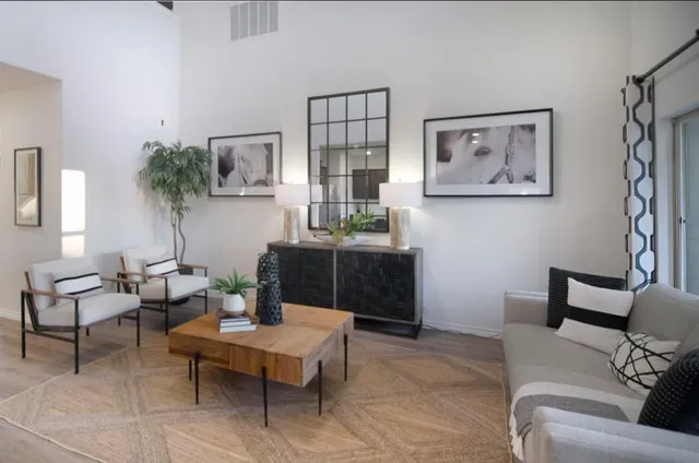 a bathroom with a double vanity sink and mirror