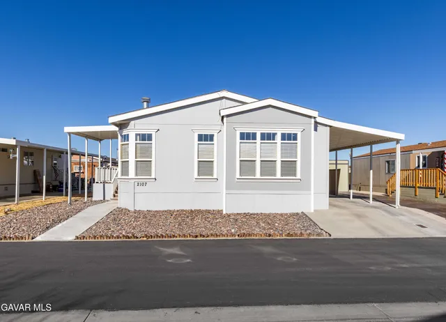 a front view of a house with a garage