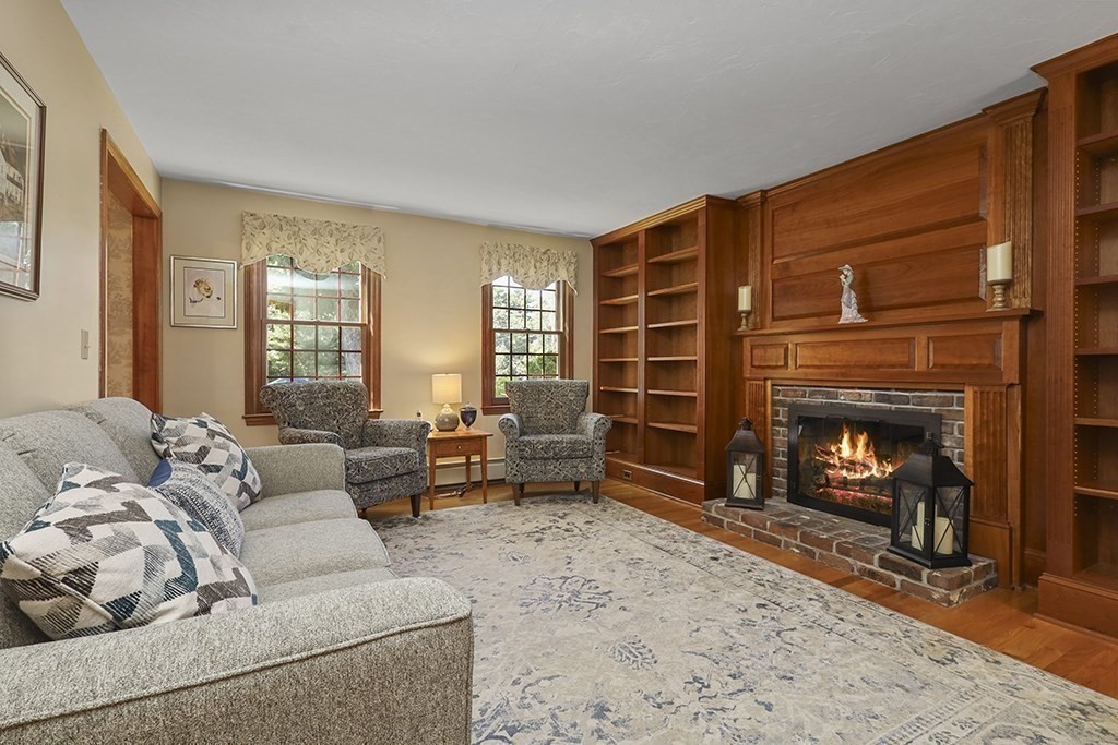 6 Lydia Lane Franklin, MA 02038 - Photo 12 of 42 a living room with furniture and a fireplace