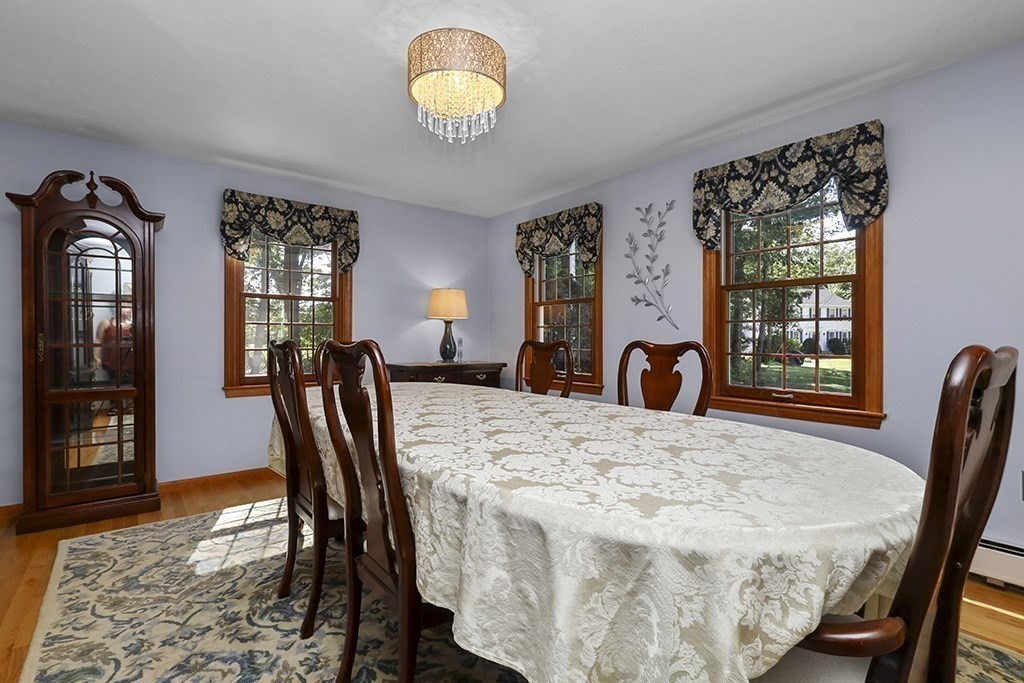 6 Lydia Lane Franklin, MA 02038 - Photo 16 of 42 a view of a dining room with furniture