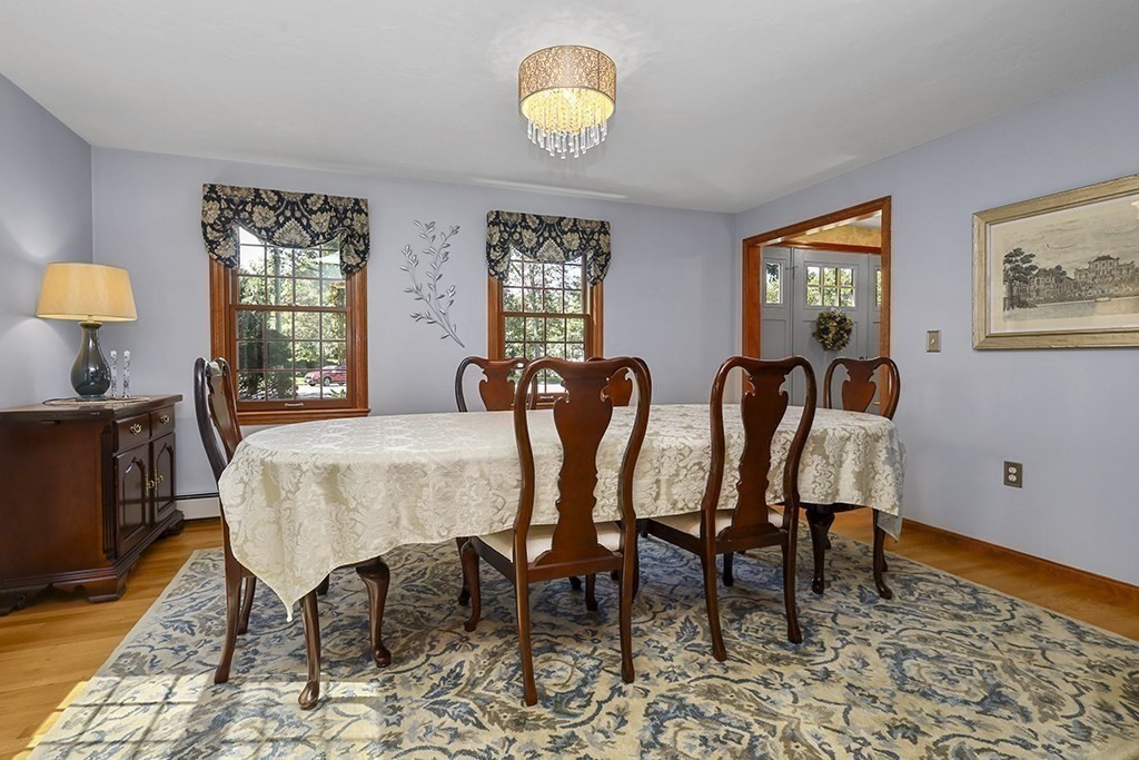 6 Lydia Lane Franklin, MA 02038 - Photo 17 of 42 a view of a dining room with furniture