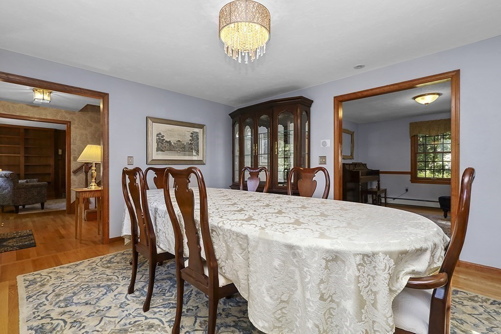 6 Lydia Lane Franklin, MA 02038 - Photo 18 of 42 a view of a dining room with furniture