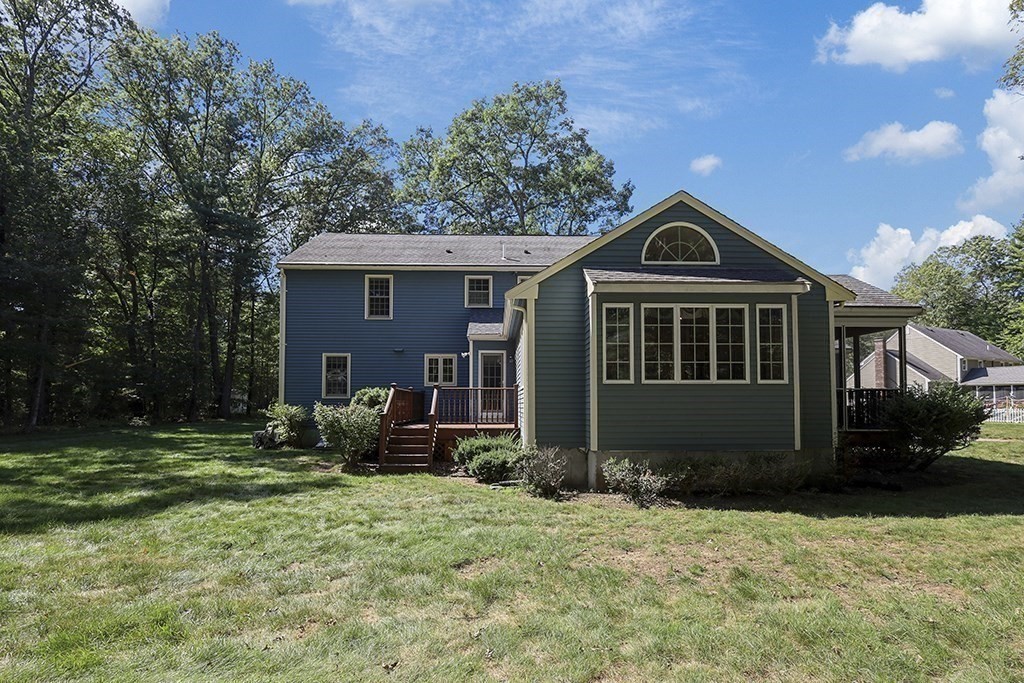 6 Lydia Lane Franklin, MA 02038 - Photo 2 of 42 a front view of a house with garden