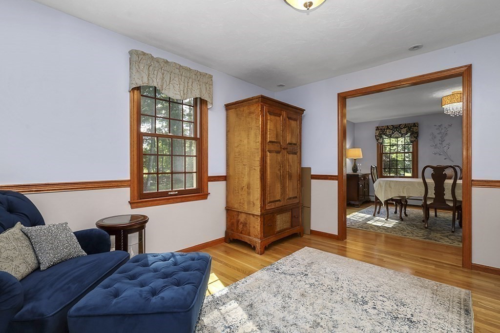 6 Lydia Lane Franklin, MA 02038 - Photo 21 of 42 a living room with furniture a rug and a window