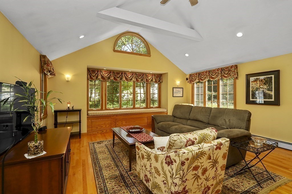 6 Lydia Lane Franklin, MA 02038 - Photo 23 of 42 a living room with furniture and a large window