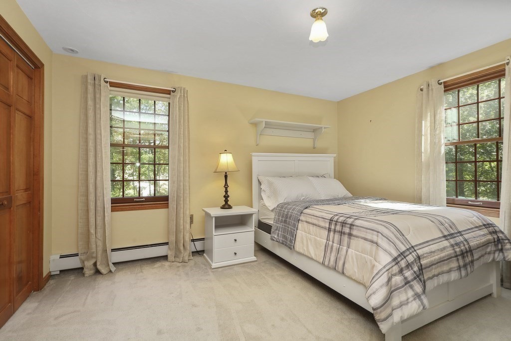6 Lydia Lane Franklin, MA 02038 - Photo 35 of 42 a bedroom with a bed and a window