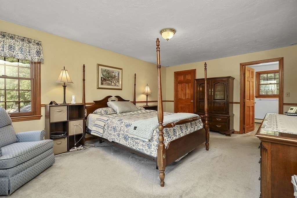 6 Lydia Lane Franklin, MA 02038 - Photo 37 of 42 a bedroom with a bed couch and a window