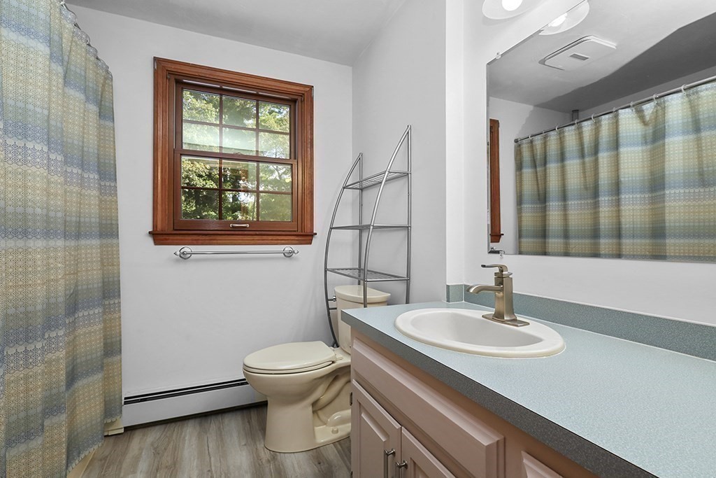 6 Lydia Lane Franklin, MA 02038 - Photo 40 of 42 a bathroom with a sink toilet and shower