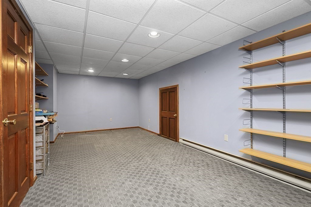 6 Lydia Lane Franklin, MA 02038 - Photo 42 of 42 an empty room with shelves
