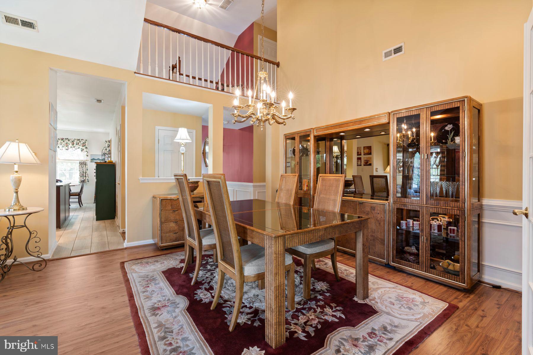 20 Black Eyed Susan Road Langhorne, PA 19047 - Photo 11 of 29 a view of a dining room with furniture and wooden floor