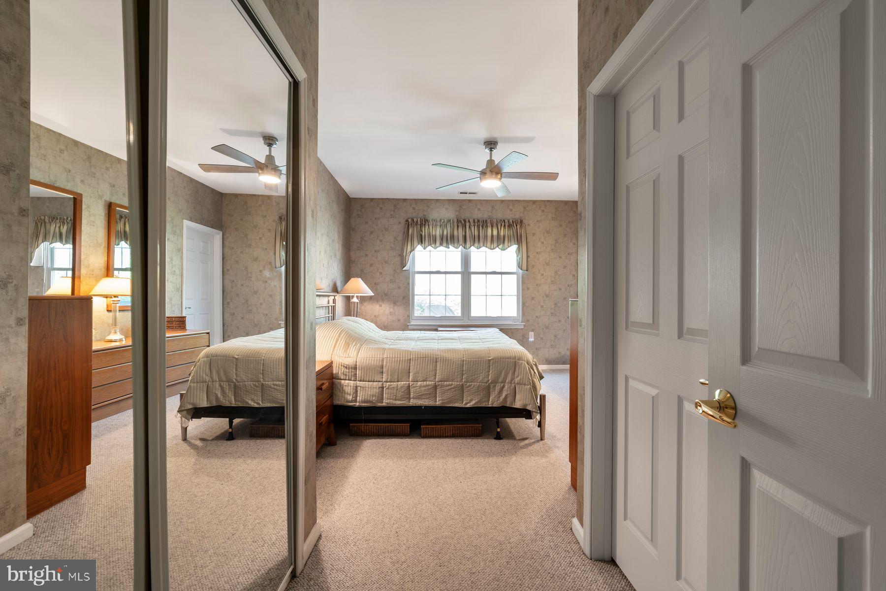 20 Black Eyed Susan Road Langhorne, PA 19047 - Photo 16 of 29 a bedroom with a bed and a window