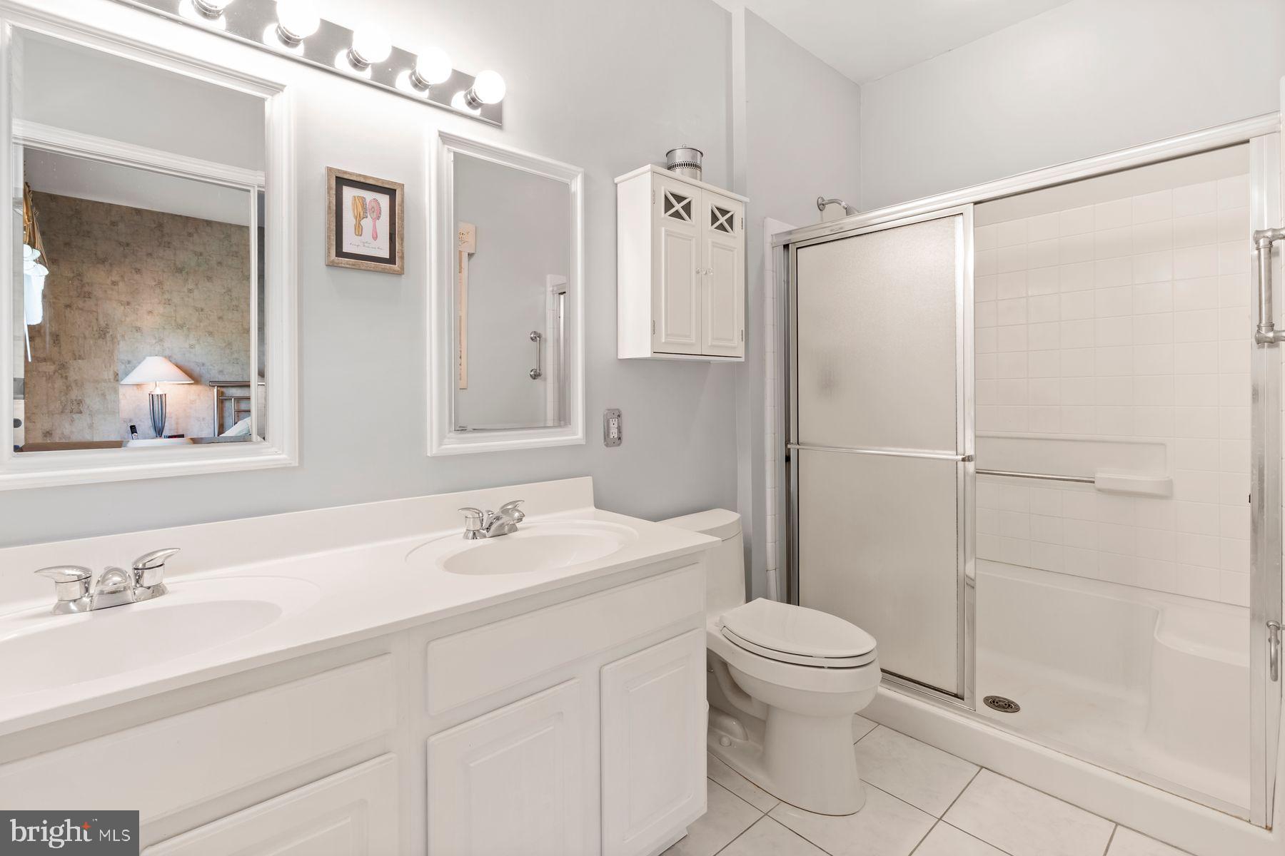 20 Black Eyed Susan Road Langhorne, PA 19047 - Photo 18 of 29 a bathroom with a sink toilet and shower