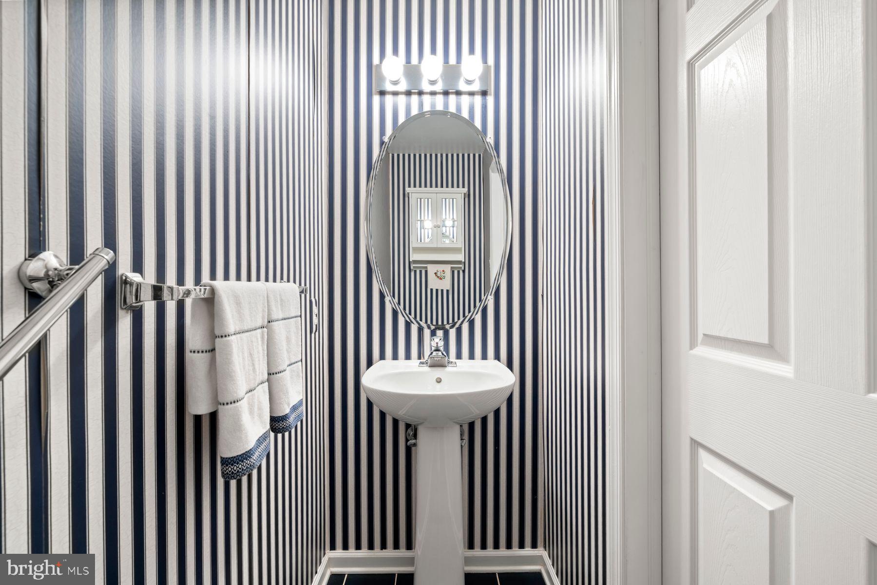 20 Black Eyed Susan Road Langhorne, PA 19047 - Photo 20 of 29 a bathroom with a sink and a mirror