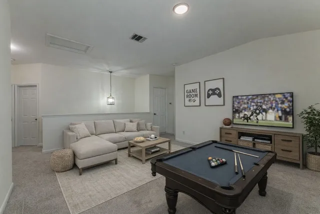 an empty room with a empty space and windows