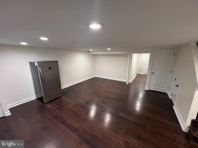 1583 Doxbury Road Towson, MD 21286 - Photo 24 of 31 an empty room with wooden floor and windows