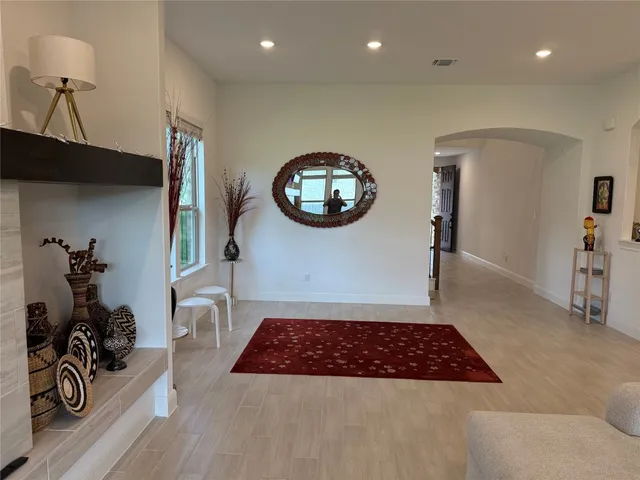 a bathroom with a toilet sink and a mirror