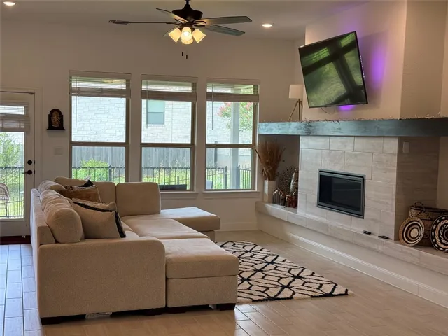 a living room with furniture and a window