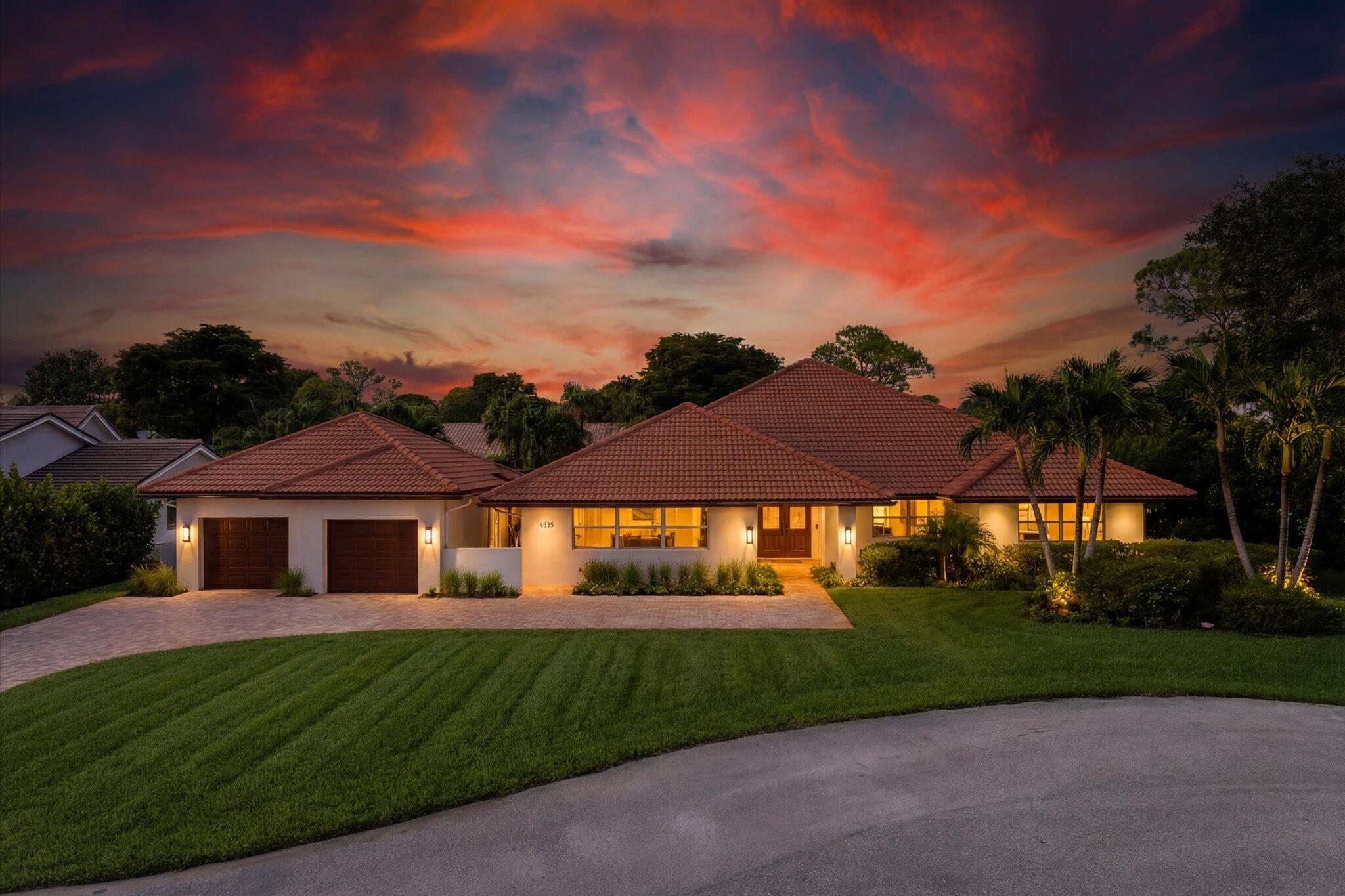 4535 Oak Tree Court Delray Beach, FL 33445 - Photo 2 of 36 01-FRONT Day dusk 1