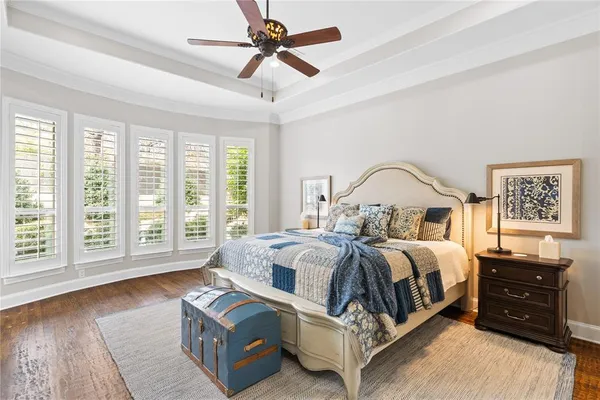a bathroom with a double vanity sink a mirror and a shower