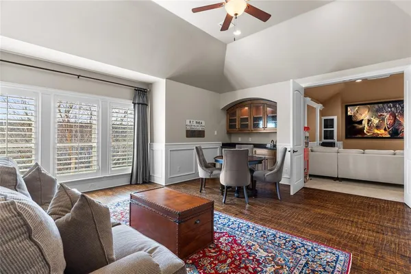 an aerial view of a house with yard
