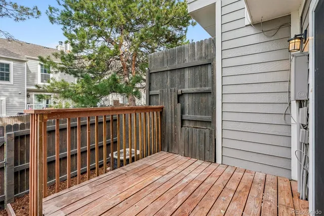 a view of a wooden balcony and wooden floor