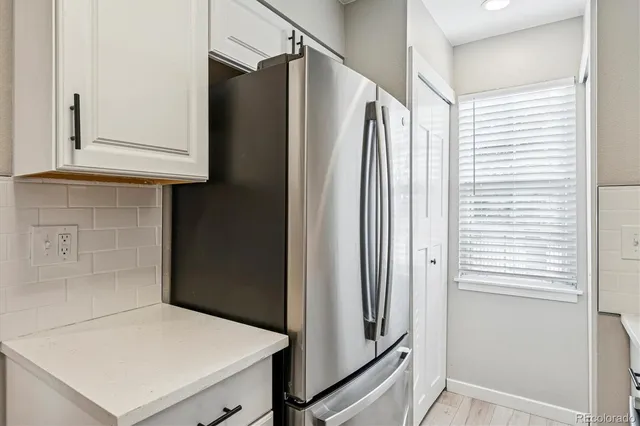 a bathroom with a shower and a sink