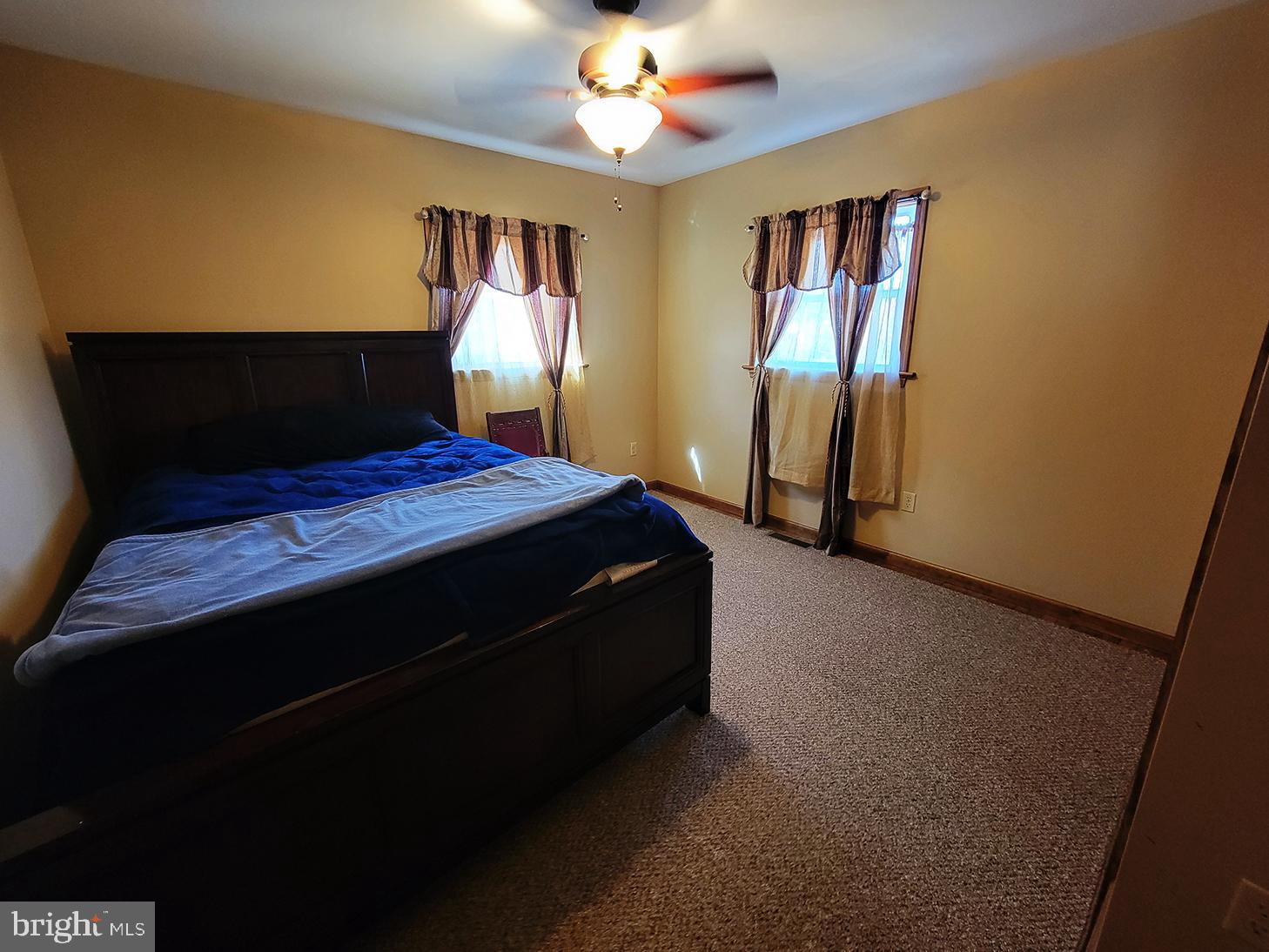 1018 Crestview Avenue Shillington, PA 19607 - Photo 12 of 47 a bedroom with bed and wooden floor
