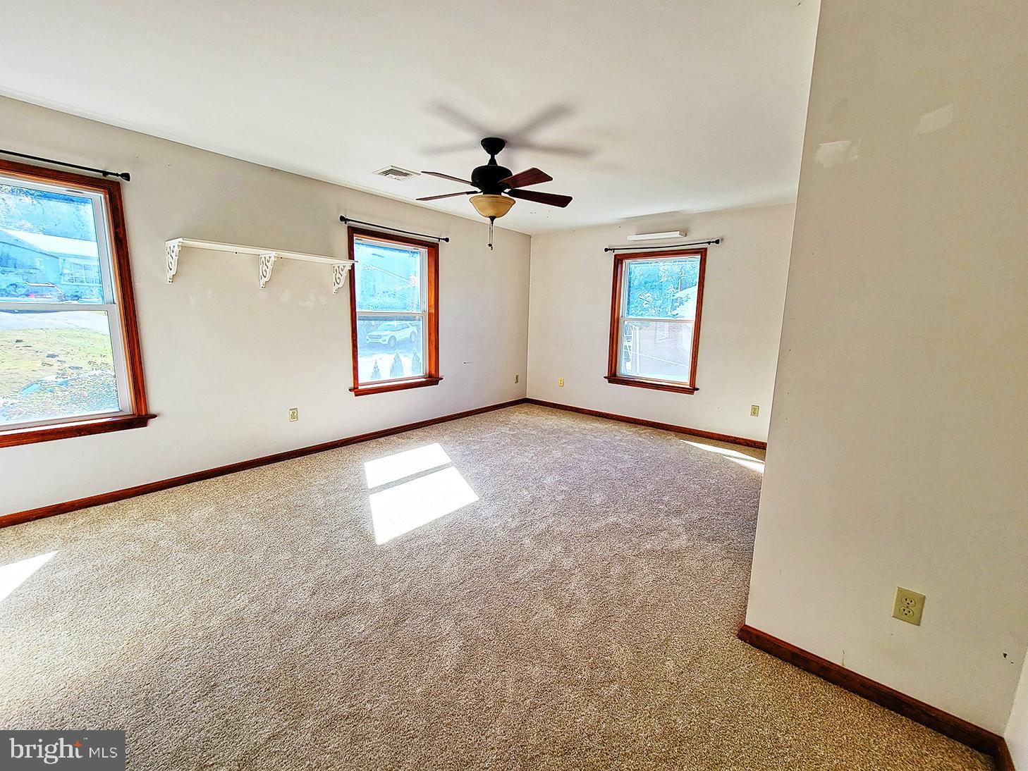 1018 Crestview Avenue Shillington, PA 19607 - Photo 18 of 47 an empty room with windows and ceiling fan