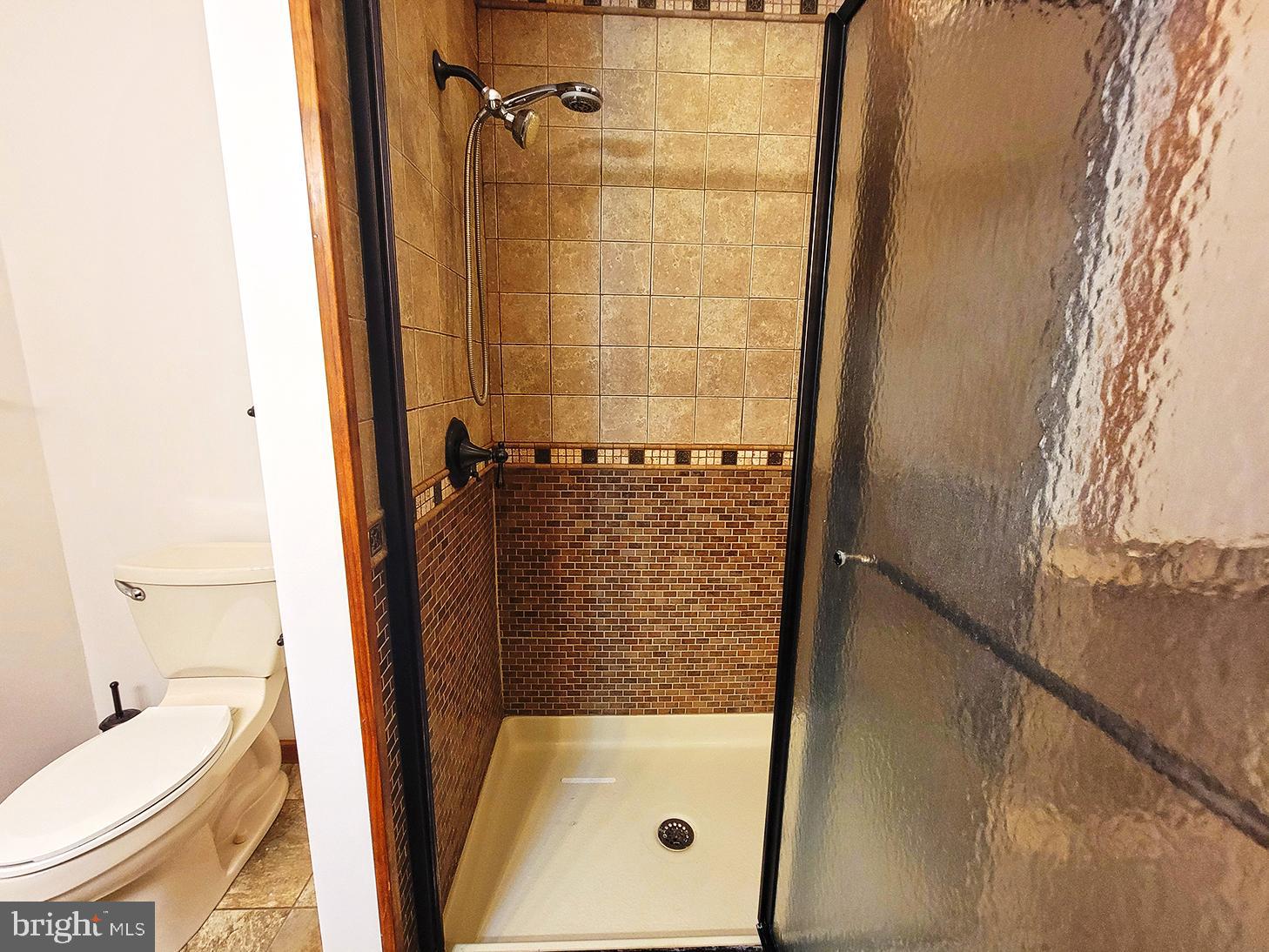 1018 Crestview Avenue Shillington, PA 19607 - Photo 26 of 47 a bathroom with a granite countertop sink toilet and shower