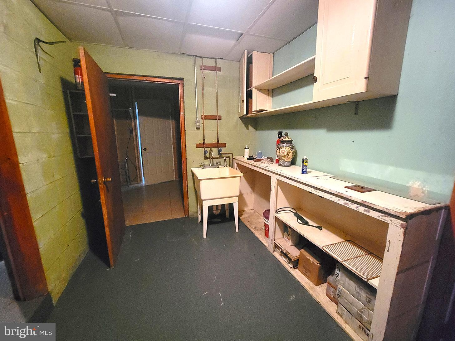 1018 Crestview Avenue Shillington, PA 19607 - Photo 39 of 47 a room with stainless steel appliances wooden floor and chair