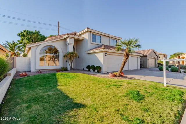 a house view with a garden space