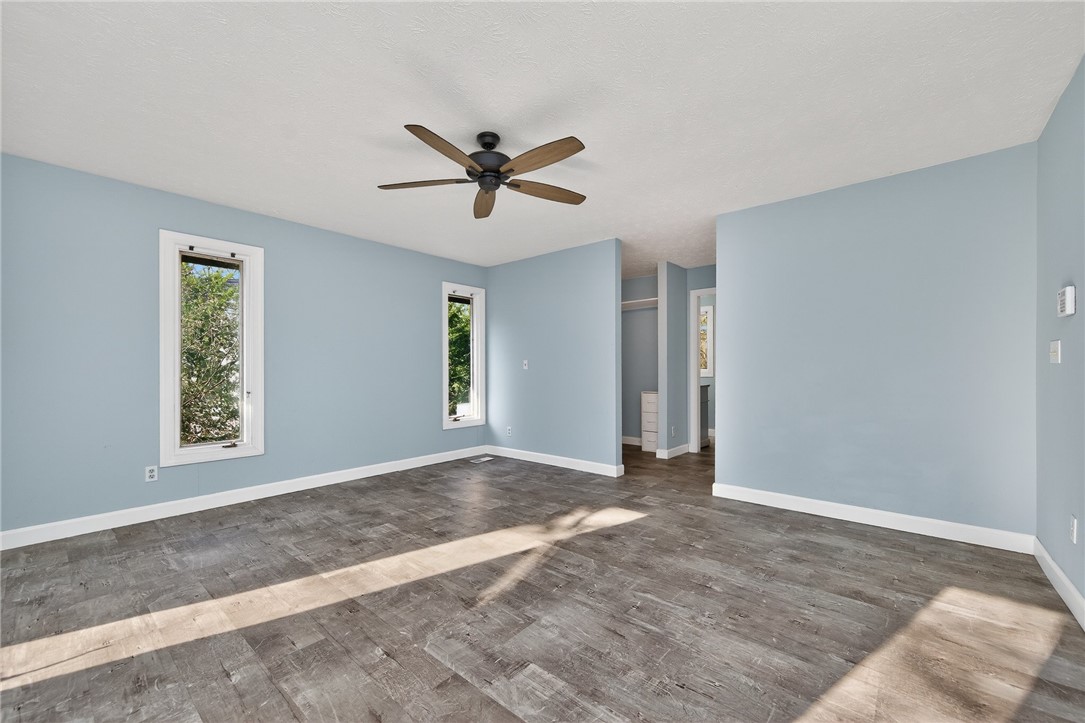 4747 Fawnwood Road Dayton, OH 45429 - Photo 27 of 58 This spacious room features ample natural light and durable flooring, offering a versatile living space.