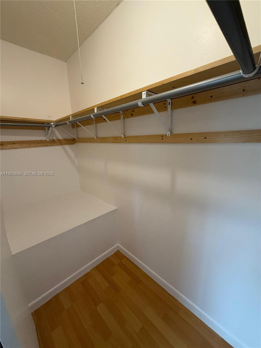 5327 Northwest 27th Street, Unit D4 Lauderhill, FL 33313 - Photo 13 of 14 a view of a room with racks on the wall
