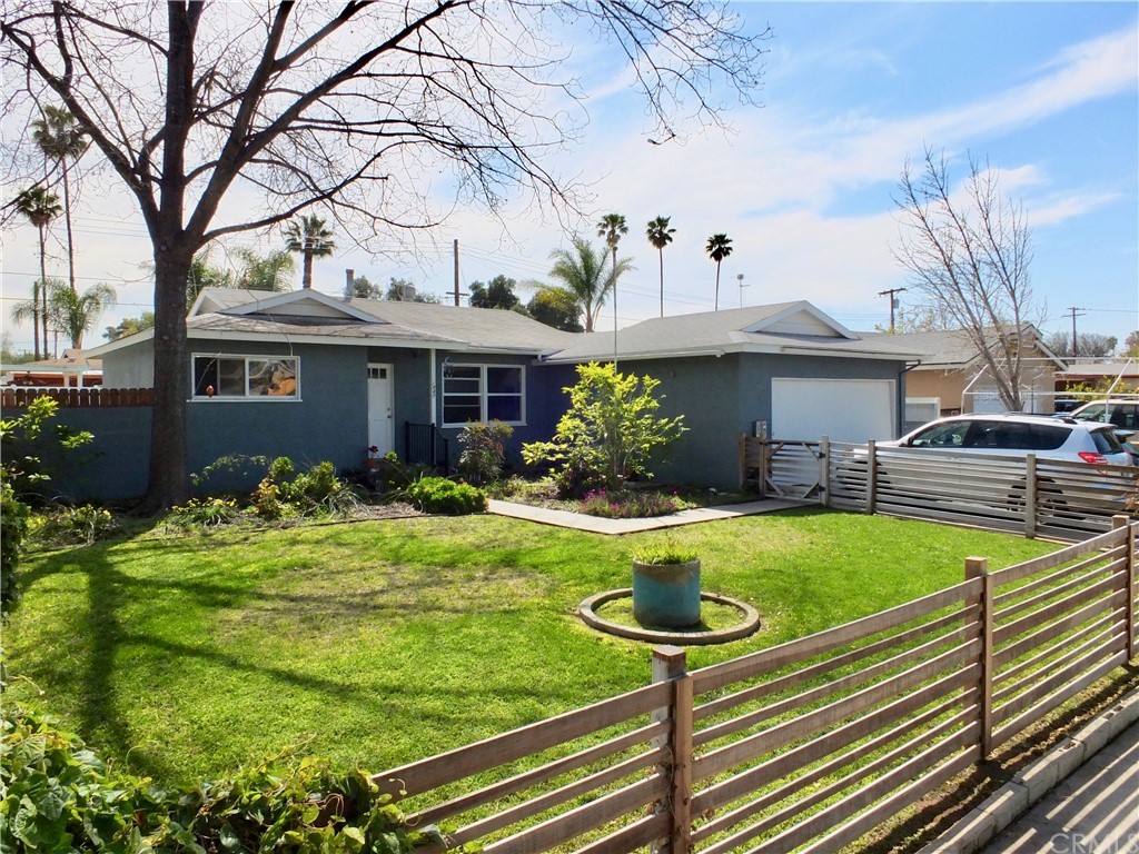 1852 Missouri Street Riverside, CA 92507 - Photo 1 of 1 a front view of house with yard and outdoor seating