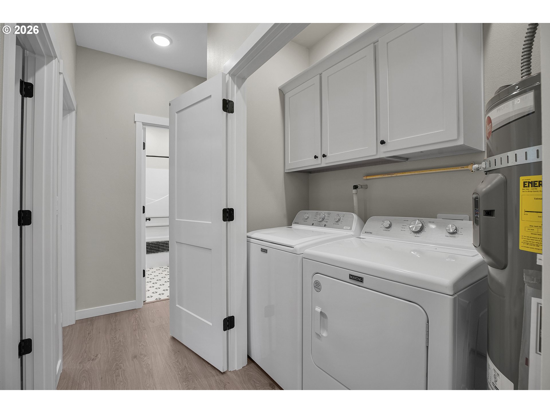 2308 Southeast Risley Avenue Milwaukie, OR 97267 - Photo 12 of 28 a utility room with closet dryer and washer