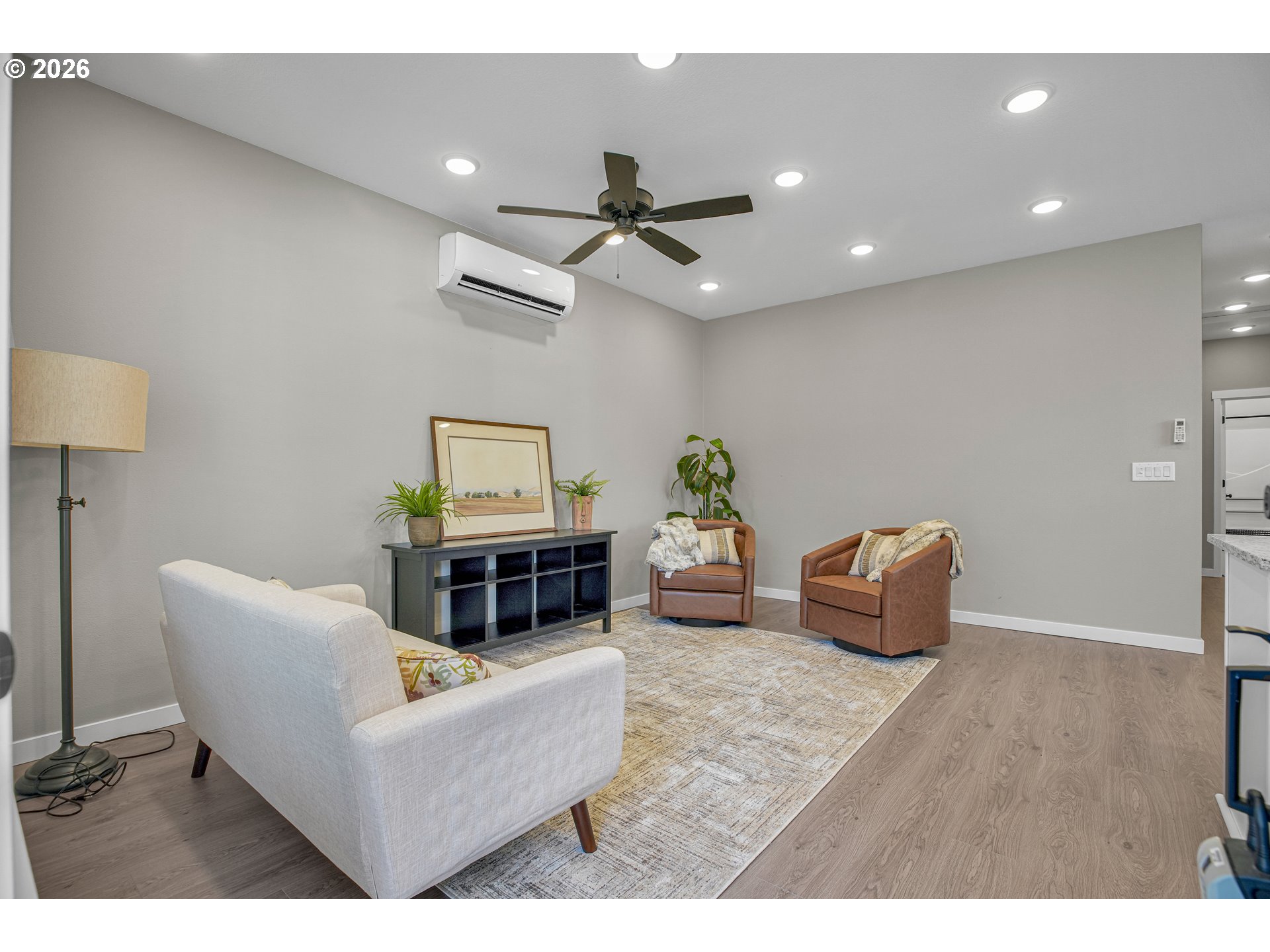 2308 Southeast Risley Avenue Milwaukie, OR 97267 - Photo 4 of 28 a living room with furniture and a wooden floor
