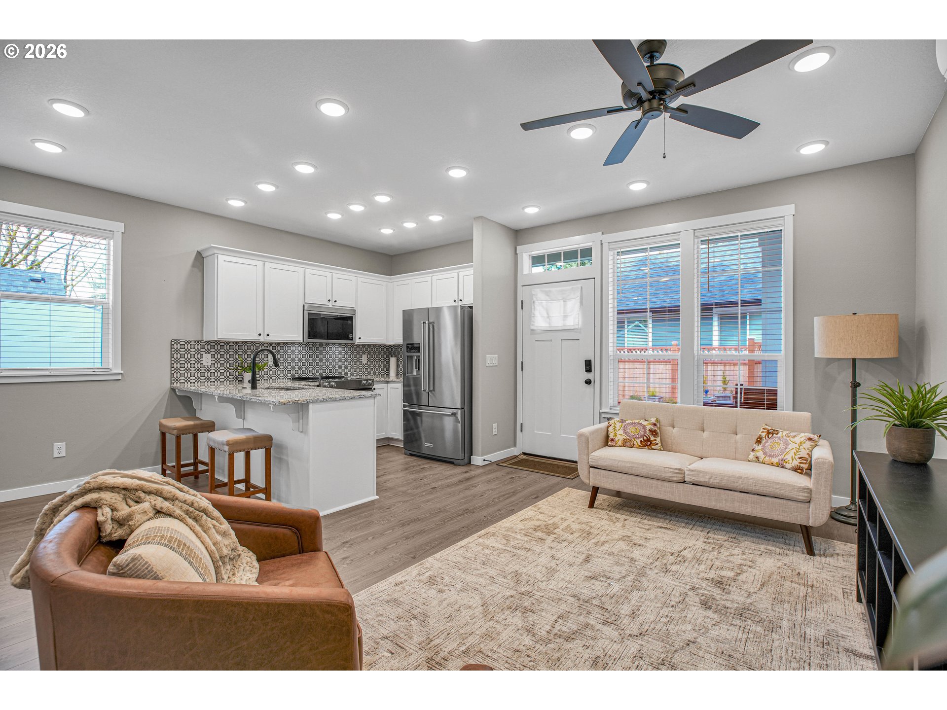 2308 Southeast Risley Avenue Milwaukie, OR 97267 - Photo 6 of 28 a living room with furniture and kitchen view
