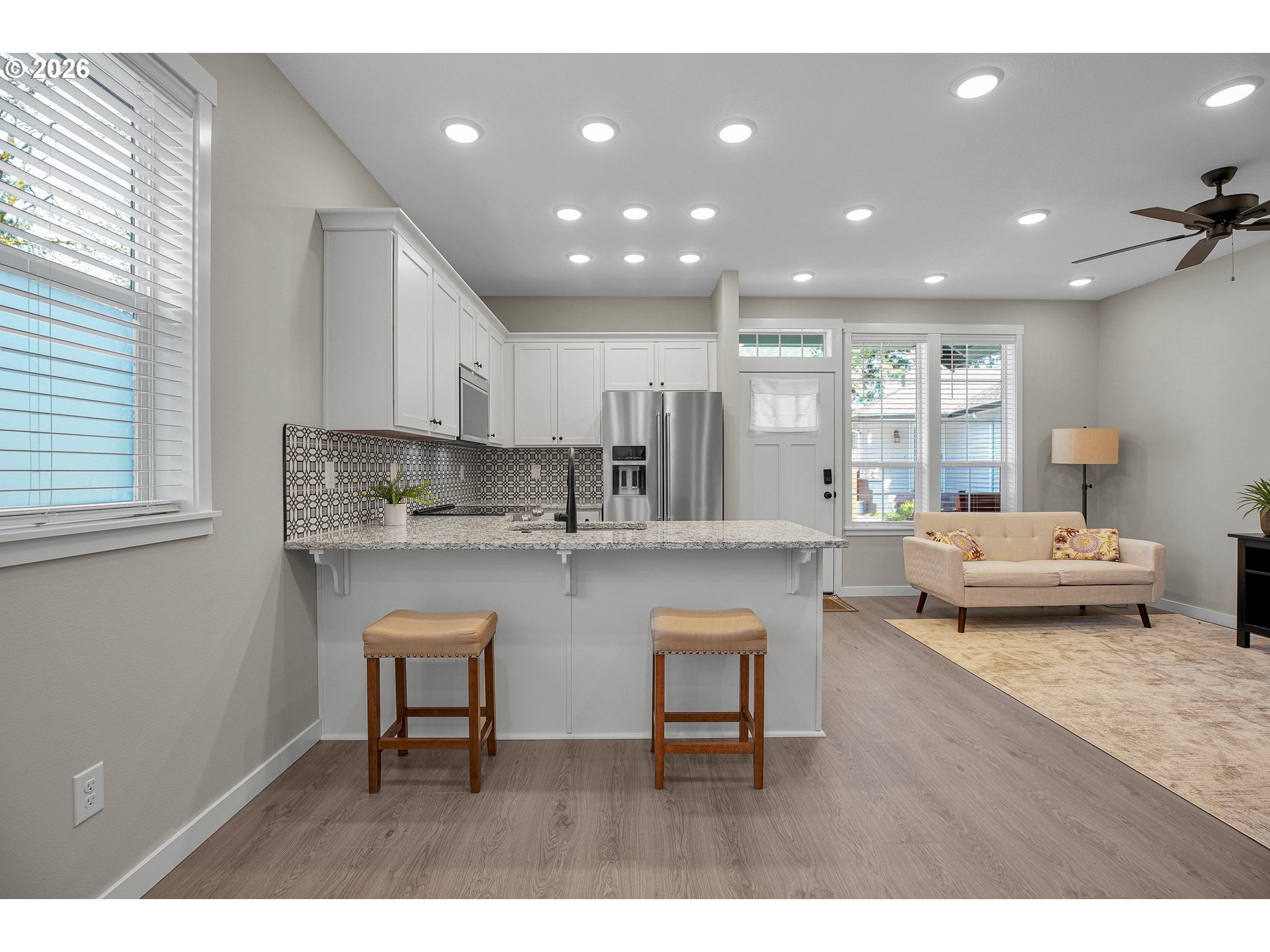 2308 Southeast Risley Avenue Milwaukie, OR 97267 - Photo 10 of 28 a living room with furniture and a table