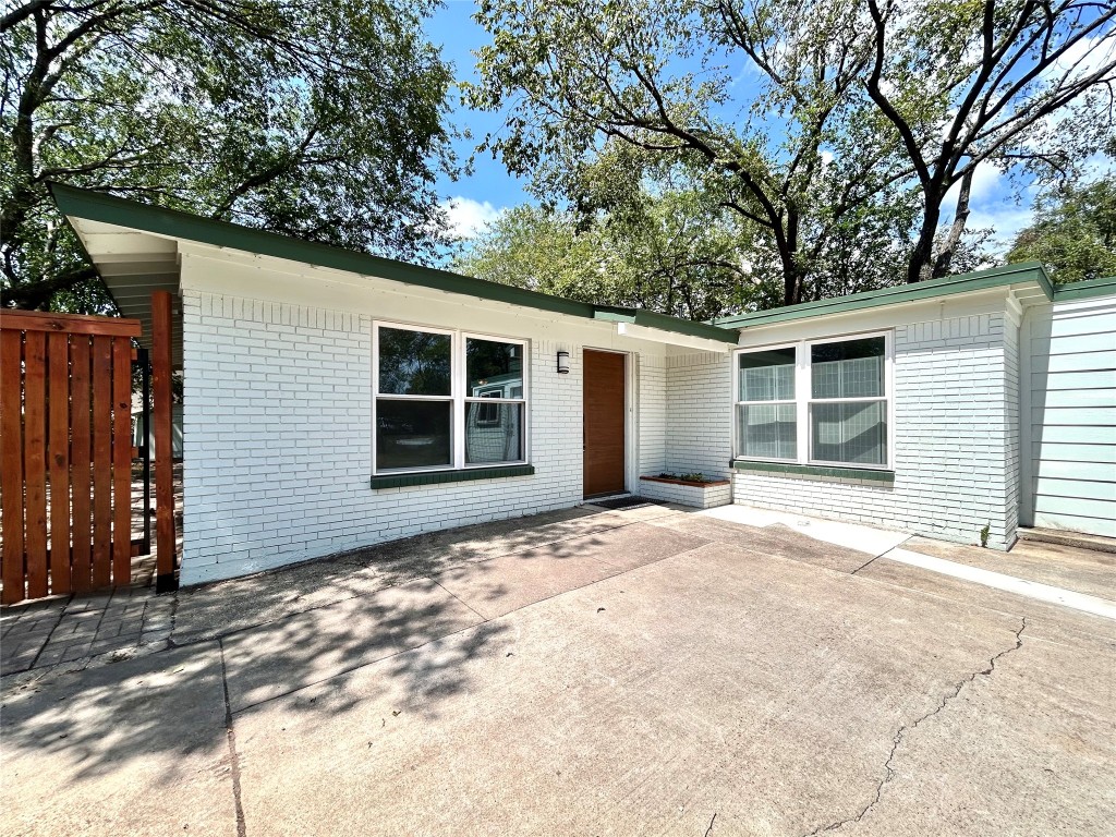 2309 Devonshire Drive, Unit A Austin, TX 78723 - Photo 2 of 39 View of front of house with a patio and brick siding